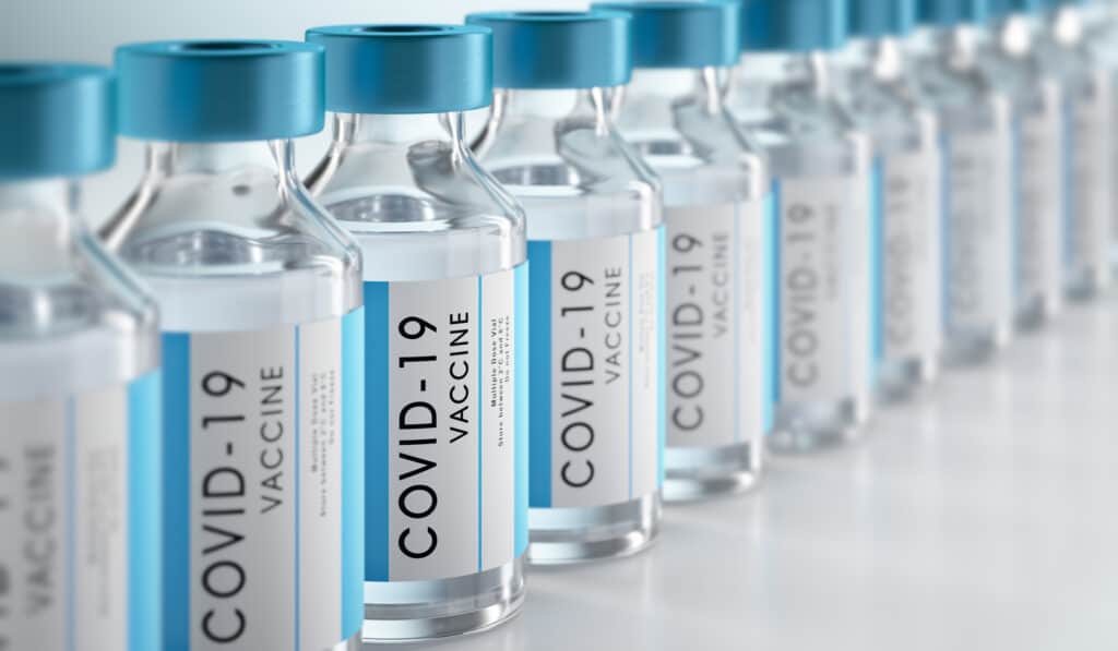 Close-up of bottles of COVID-19 vaccine Covid-19 Vaccine Injury